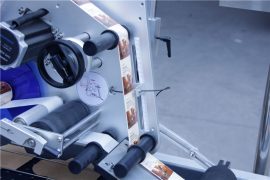 Detalles de la máquina etiquetadora de etiquetas adhesivas de paginación automática
